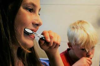 Brushing your teeth regularly at least twice a day