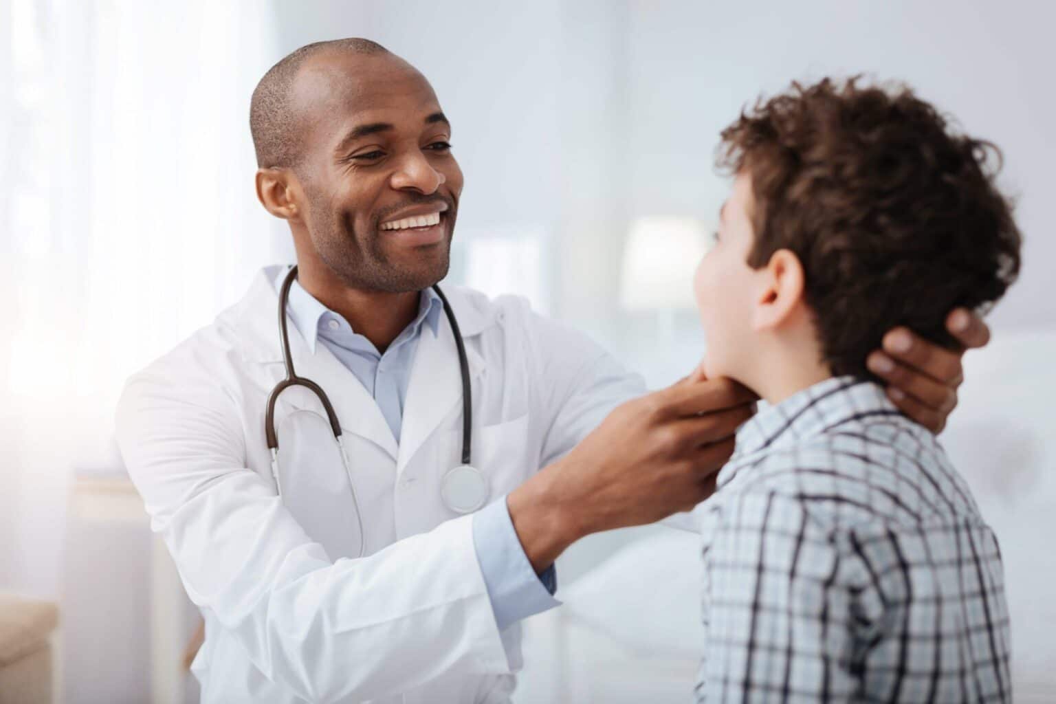 paediatrician doctor with child scaled 1