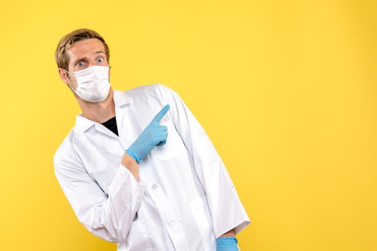 The Enduring Importance of White Lab Coats in Modern Healthcare front view male doctor confused yellow background health covid virus pandemic 179666 11462